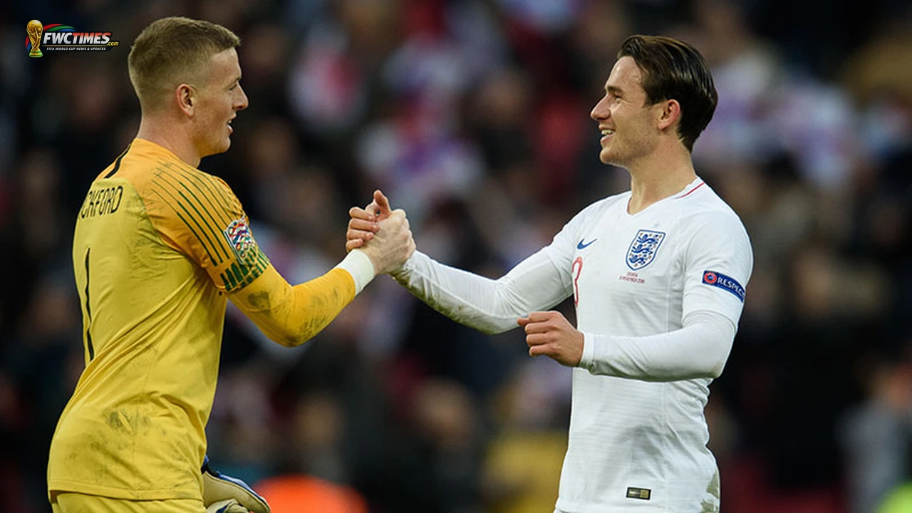 Jordan Pickford applauds while on England duty