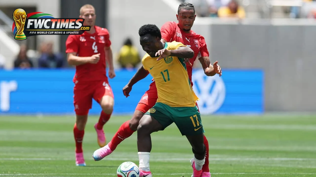 Tete Yengi celebrates after scoring for Australia against Switzerland